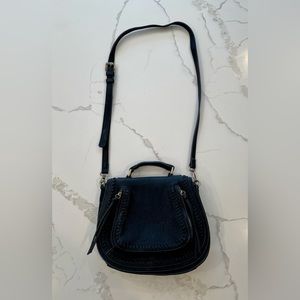 Crossbody vegan saddle bag